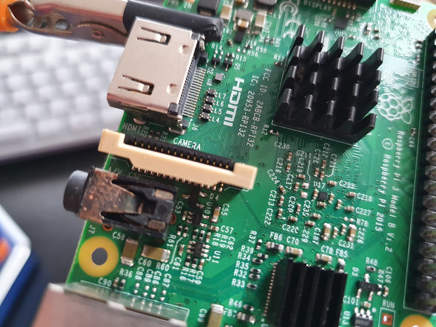 The Raspberry Pi 3B CSI connector, notice the pins are facing away from the white locking tab